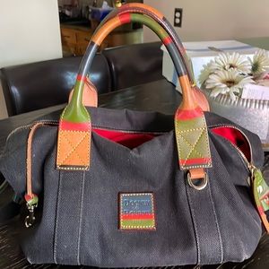 Small denim duffle with leather details. Will accept reasonable offers